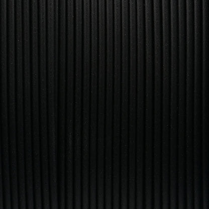 Close-up texture of Jet Black 1.75mm PLA 3D printer filament