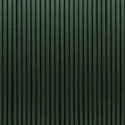 High-resolution macro shot of Emerald Green metallic PLA filament