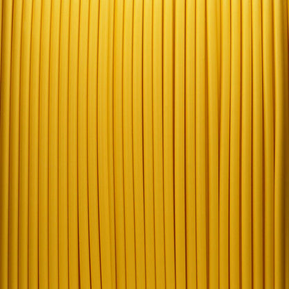 Macro texture view of Turmeric Yellow Pastel PLA 3D filament