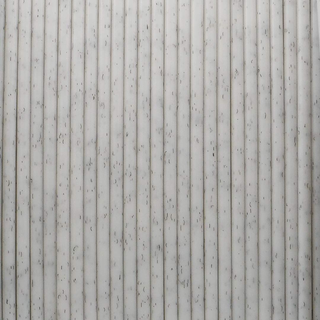 Macro detail of 3D printed marble texture showing high-quality grain